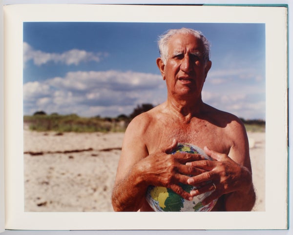 Swimming (Signed Deluxe Edition with 9 Photographs).