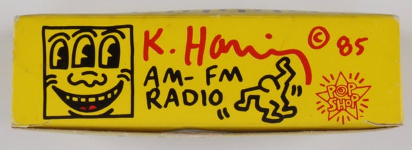 AM-FM Radio with Carrying Strap.