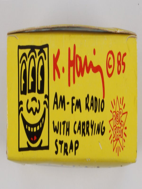 AM-FM Radio with Carrying Strap.