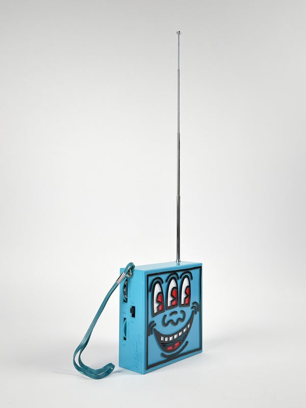 AM-FM Radio with Carrying Strap.